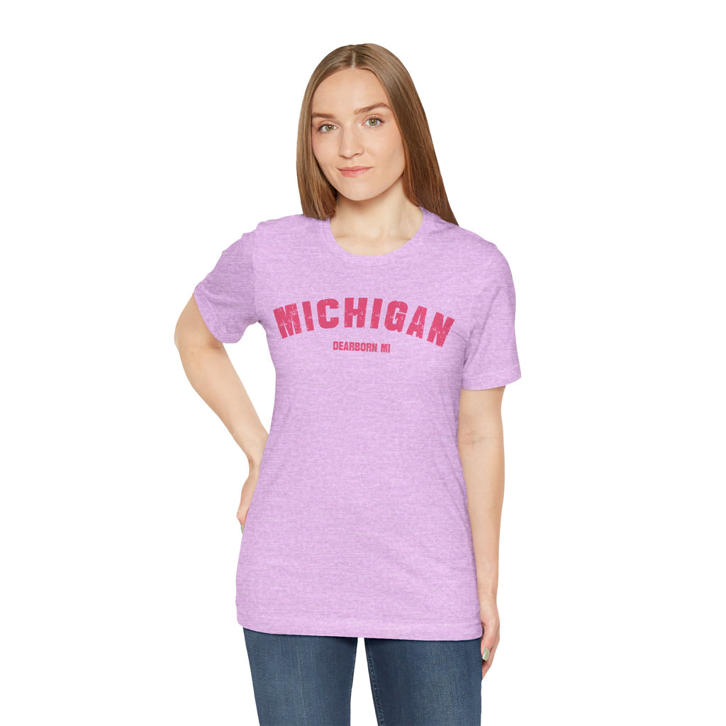 Model in the lilac personalized Michigan t-shirt, pink varsity MICHIGAN above a DEARBORN MI line