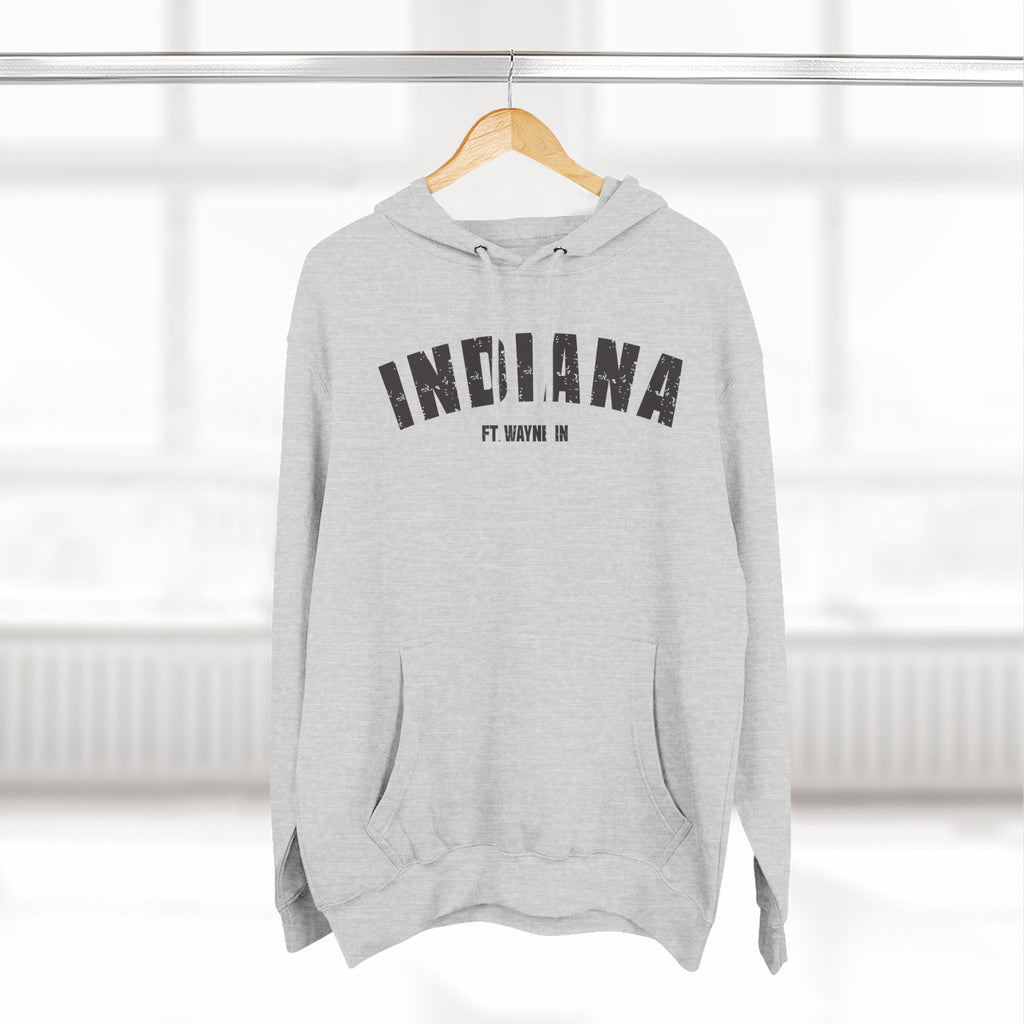 Heather Grey personalized Indiana hoodie on a wooden hanger, charcoal varsity INDIANA and a hometown line