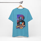 Teal t-shirt on a hanger, front view showing the full 'B' Brooklyn Bridge sunset skyline graphic and 'Brooklyn AF' logo