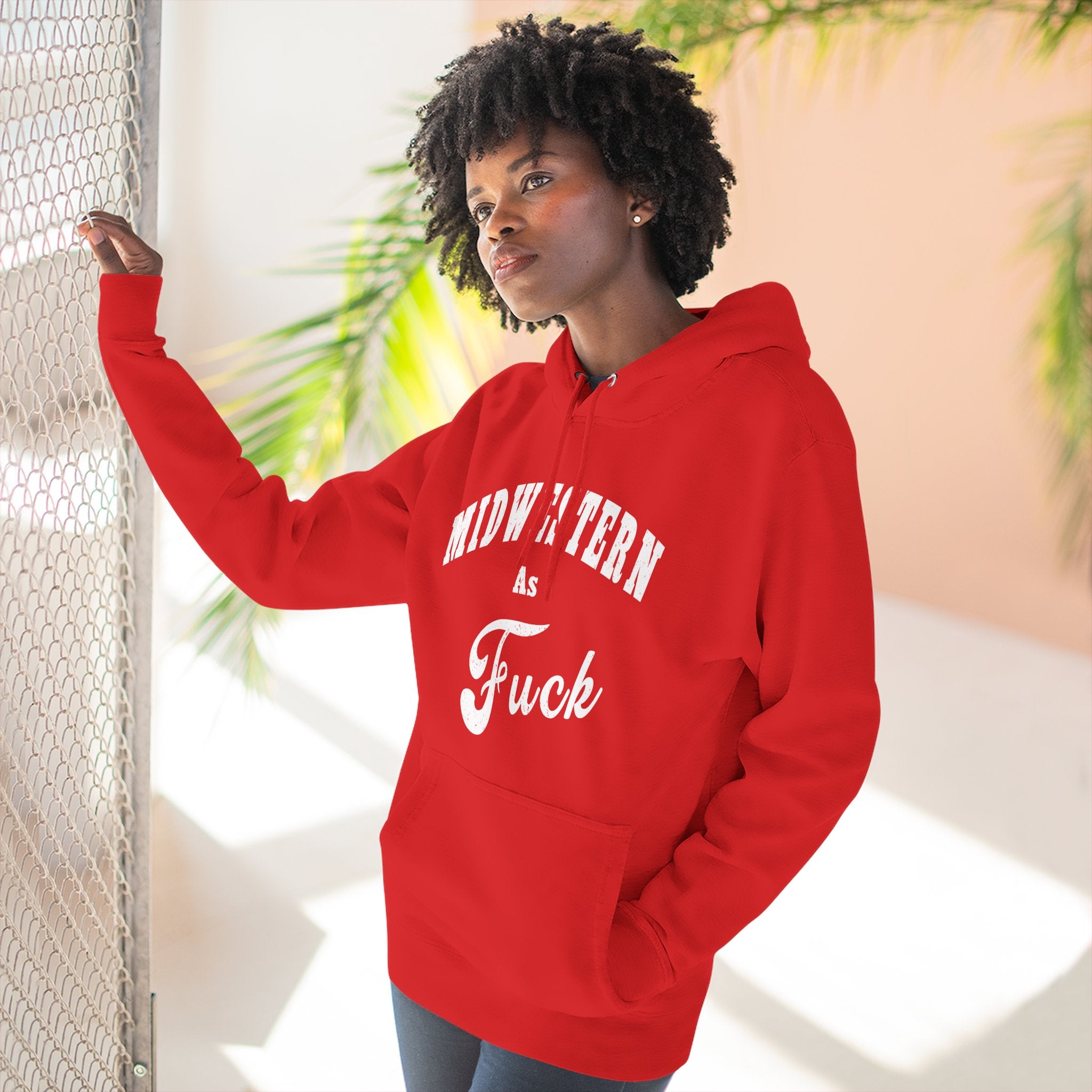 Woman wearing the Midwestern As Fuck Hoodie in Red – Lane Seven fleece pullover, Anything AF Midwest pride hoodie