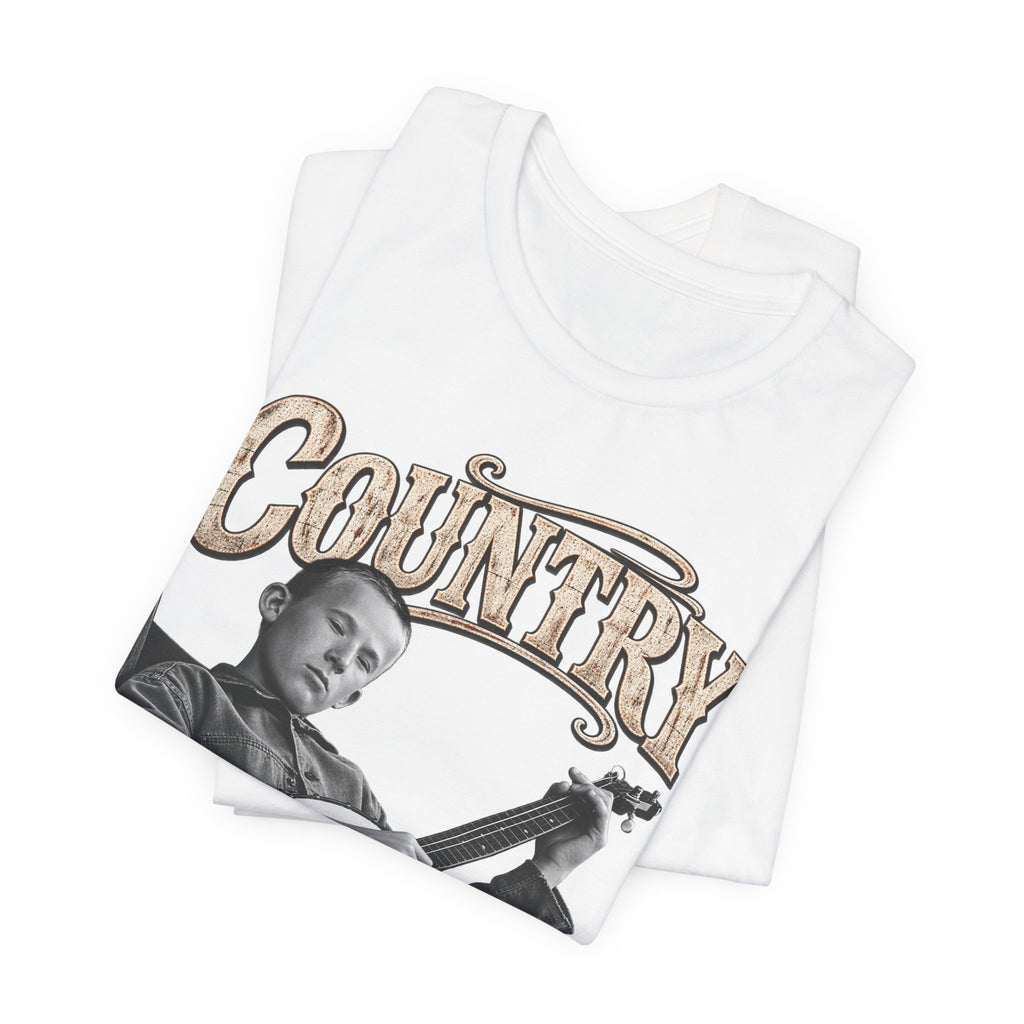 White Country As Fuck tee folded in a stack, front graphic angled on top