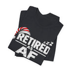 Black Retired AF tee folded, the white RETIRED AS AF lettering angled across the fold