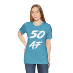 Woman wearing the Heather Aqua 50 AF birthday t-shirt with jeans