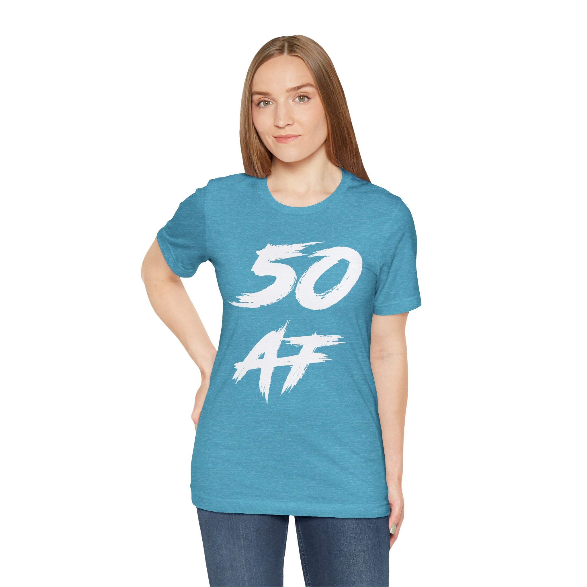 Woman wearing the Heather Aqua 50 AF birthday t-shirt with jeans