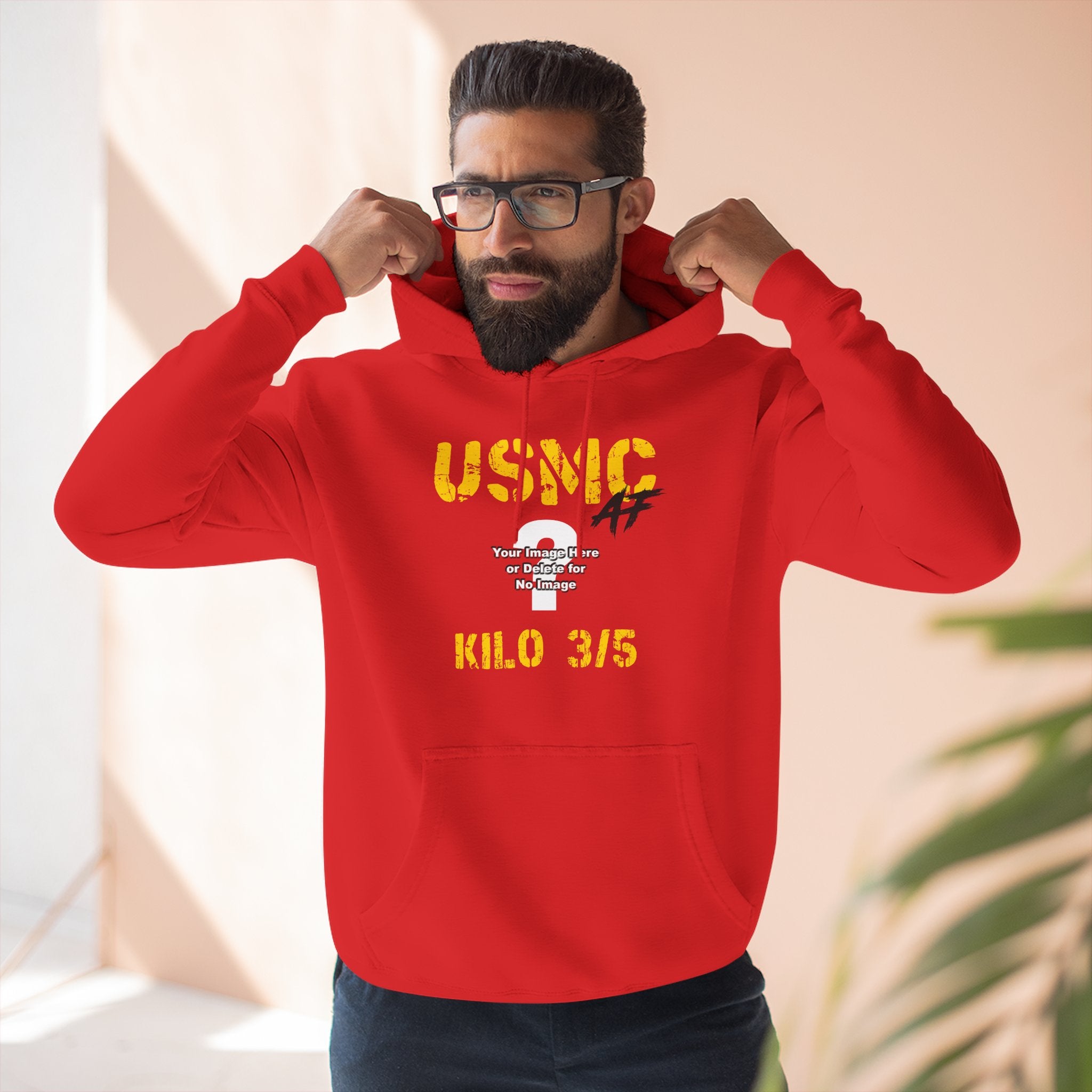 Man wearing the Personalized USMC Marine Corps AF hoodie in Red, pulling up the hood