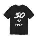 Black birthday tee laid flat, white distressed 50 AS FUCK lettering across the chest