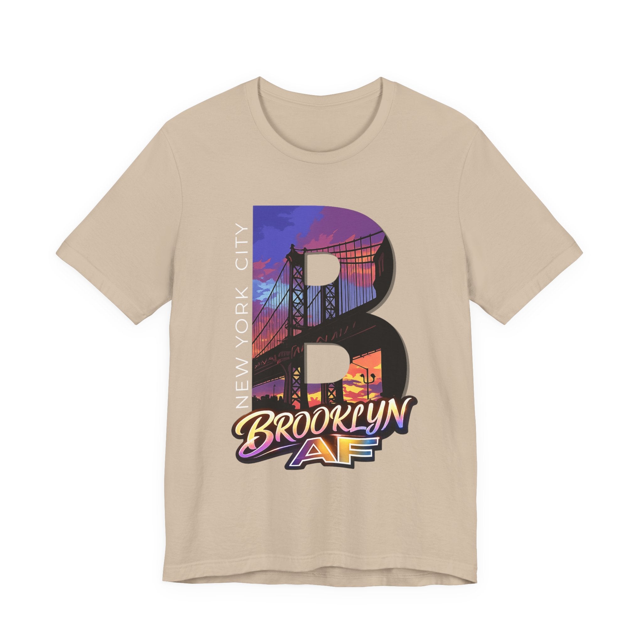 Vintage white t-shirt, flat lay front view, with a bold B and a purple-orange Brooklyn Bridge sunset skyline graphic.