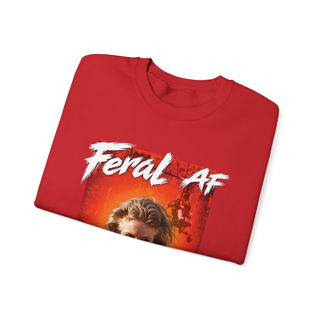 Red Feral AF sweatshirt folded neatly with the FERAL AF lettering across the top