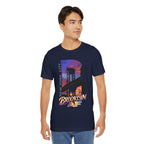 Navy t-shirt worn by a model, front view showing the full 'B' Brooklyn Bridge sunset skyline graphic and logo