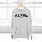 Heather Grey custom Illinois hoodie on a wooden hanger, charcoal varsity ILLINOIS above a Chicago IL line