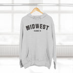 Heather Grey personalized Midwest hoodie on a wooden hanger by a window