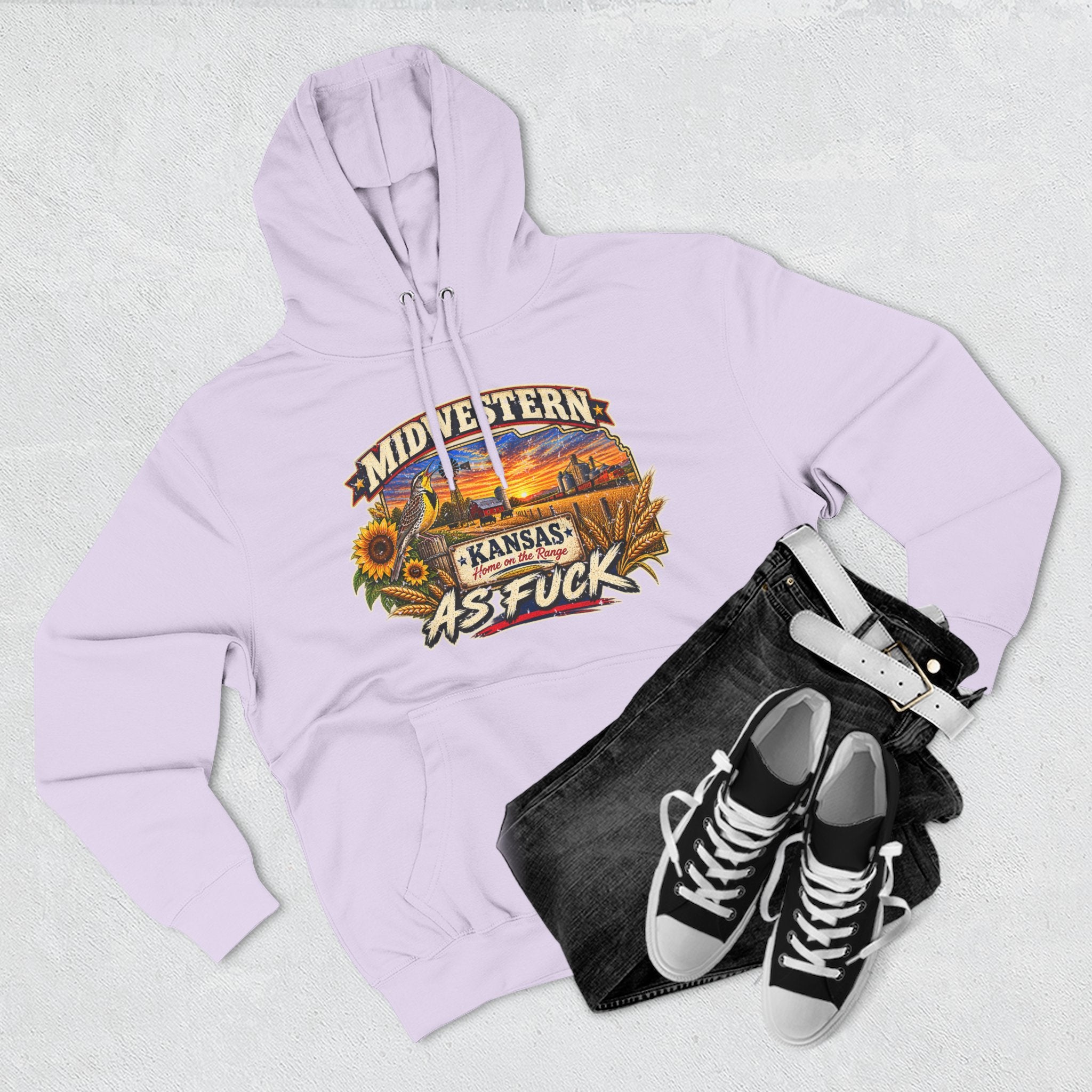Lilac Kansas As Fuck hoodie flat-lay styled with dark jeans and sneakers