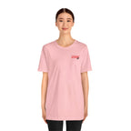 Woman wearing the personalized Marine Corps veteran T-shirt in Pink, full-length studio shot
