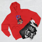 Red hoodie styled with black jeans, belt, and sneakers, bold B with a Brooklyn Bridge sunset skyline graphic.