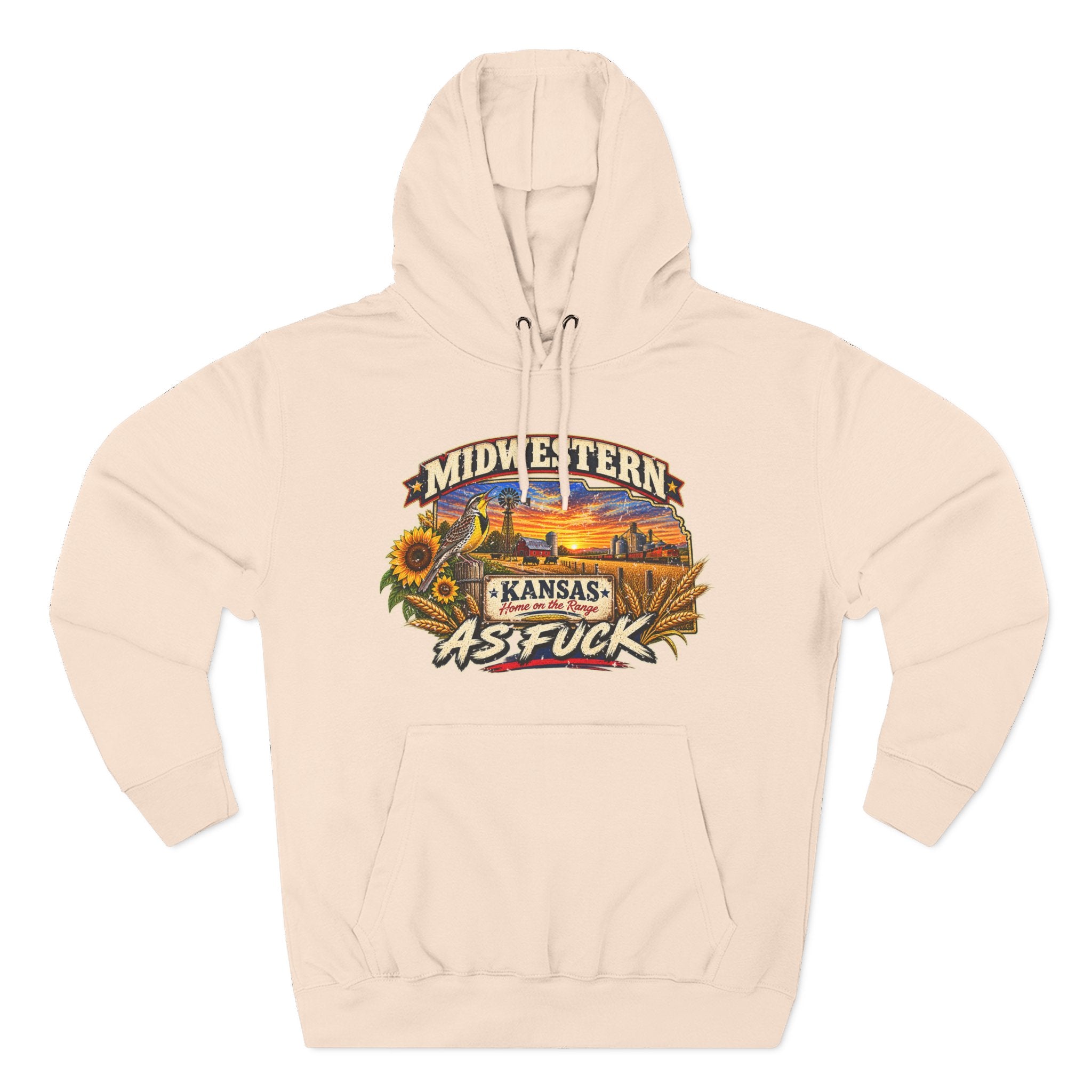 Pale pink Kansas As Fuck hoodie laid flat, wheat and sunflowers framing the sunset