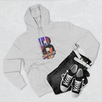 Heather grey hoodie styled with black jeans, belt, and sneakers, bold B with a Brooklyn Bridge sunset skyline graphic.