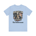 Light blue flat lay tee with Uncle Sam graphic and custom "American As Fuck, The Robertsons" text
