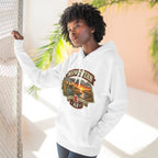Woman in the white Nebraska hoodie outdoors, showing the front sunset graphic
