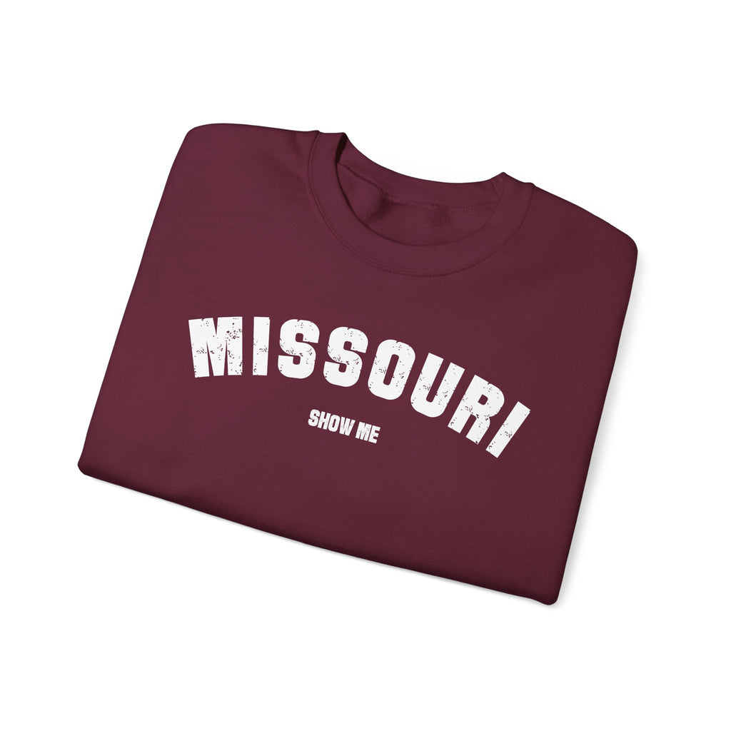 Maroon Missouri sweatshirt folded, showing white varsity MISSOURI lettering above SHOW ME