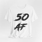 White birthday t-shirt laid flat with the black brush-script 50 AF print