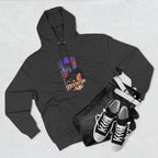 Black hoodie flat lay styled with jeans, white belt, and sneakers, showing the oversized "B" skyline graphic.