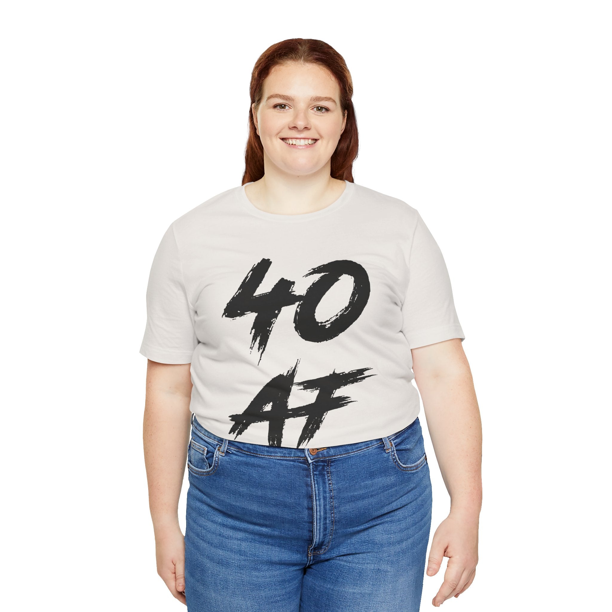 Smiling woman in the Vintage White tee customized to read 40 AF