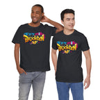 Black t-shirts worn by two male models, front view, featuring graffiti-style Brooklyn AF lettering over a skyline.