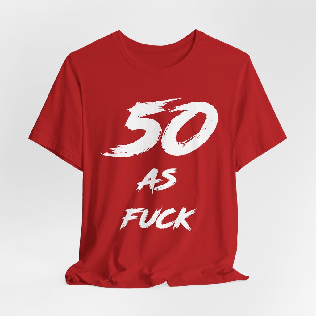 Red birthday t-shirt laid flat and slightly rumpled, white 50 AS FUCK front graphic