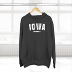 Charcoal heather Iowa hoodie on a hanger, white varsity IOWA lettering over DES MOINES IA