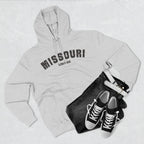 Heather grey Missouri hoodie styled flat with denim and trainers, varsity MISSOURI over KCMO PROUD