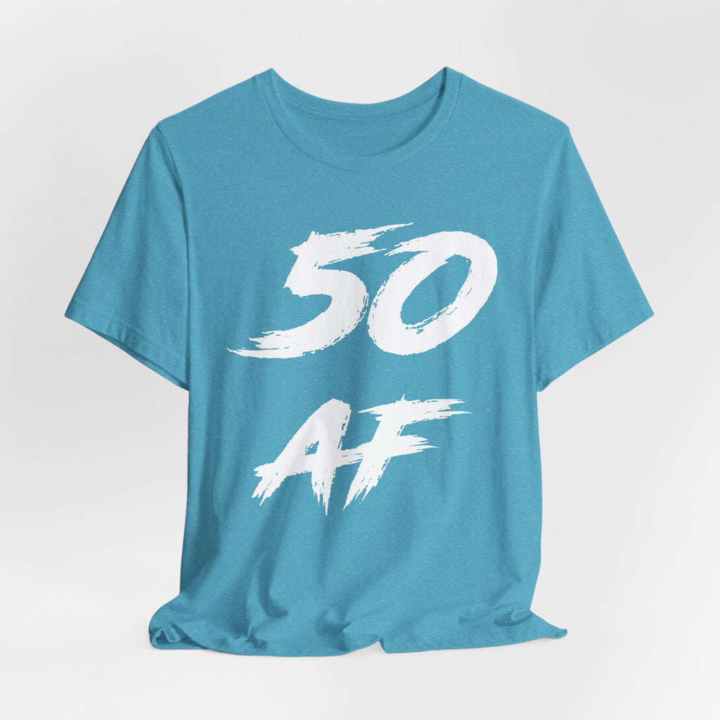 Close crop of the Heather Aqua tee laid flat, white 50 AF brush strokes in detail
