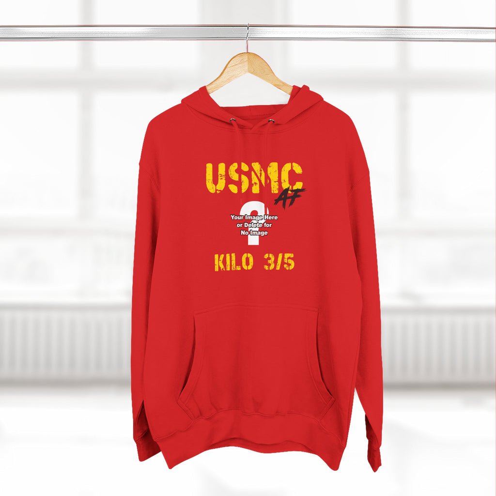 Personalized USMC Marine Corps AF hoodie in Red on a wooden hanger in a bright room