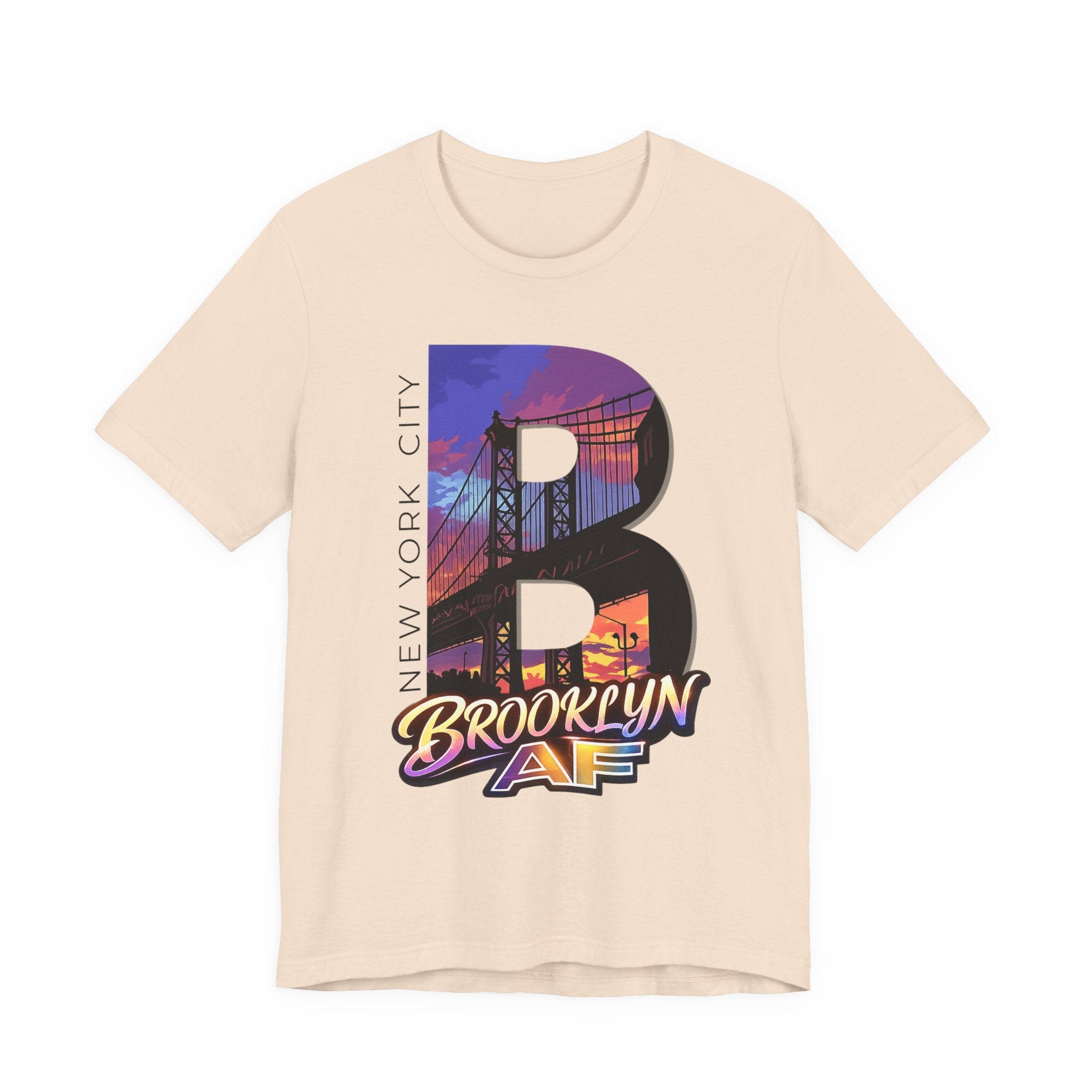 Vintage white t-shirt, flat lay, with a bold "B" Brooklyn Bridge sunset skyline graphic and Brooklyn AF logo.