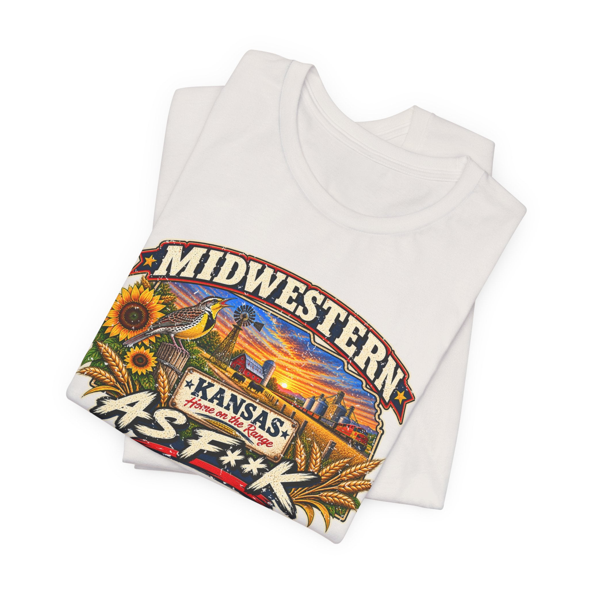 Folded natural Kansas As F**K tee, close on the Kansas Home on the Range sign