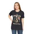 Black t-shirt worn by a female model facing forward, full Uncle Sam AF Made In Texas graphic visible.