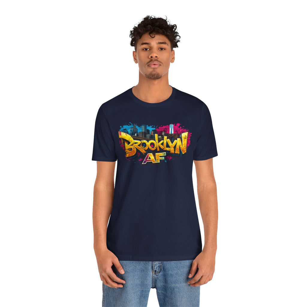 Navy t-shirt worn by a male model, front view, featuring graffiti Brooklyn AF lettering over a skyline graphic.