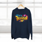 Navy hoodie hanging on a wooden hanger, showing the colorful graffiti-style Brooklyn AF skyline print.