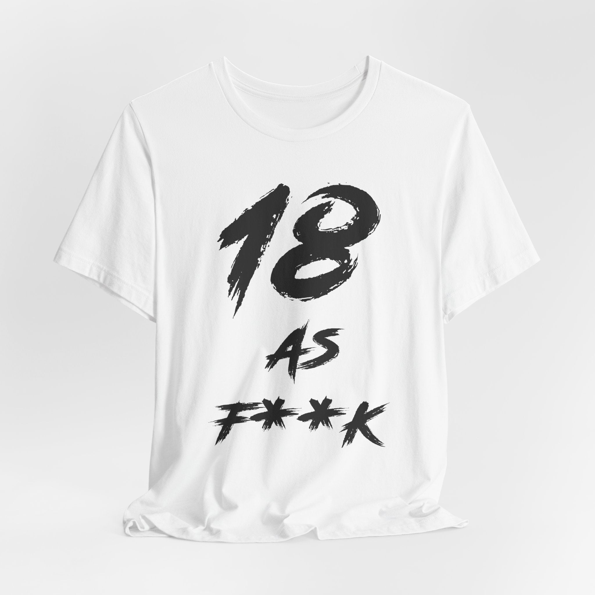White birthday t-shirt laid flat and rumpled with the black 18 AS F**K print