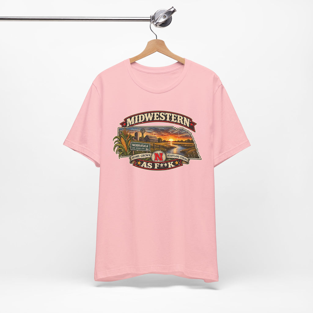 Pink Nebraska As F**K T-shirt hanging on a wooden hanger