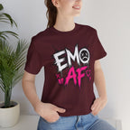 Woman wearing the Maroon EMO AF T-Shirt indoors beside a houseplant