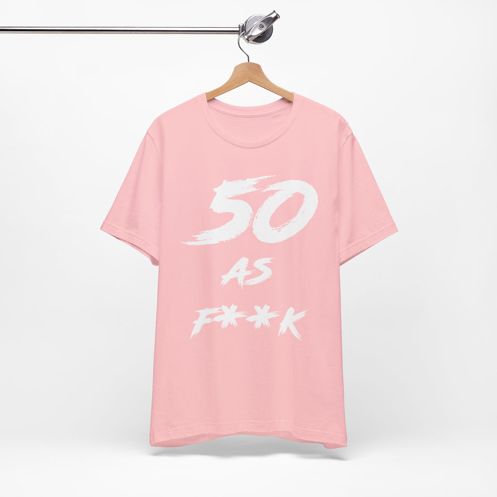 Pink birthday t-shirt on a hanger with the white 50 AS F**K brush print