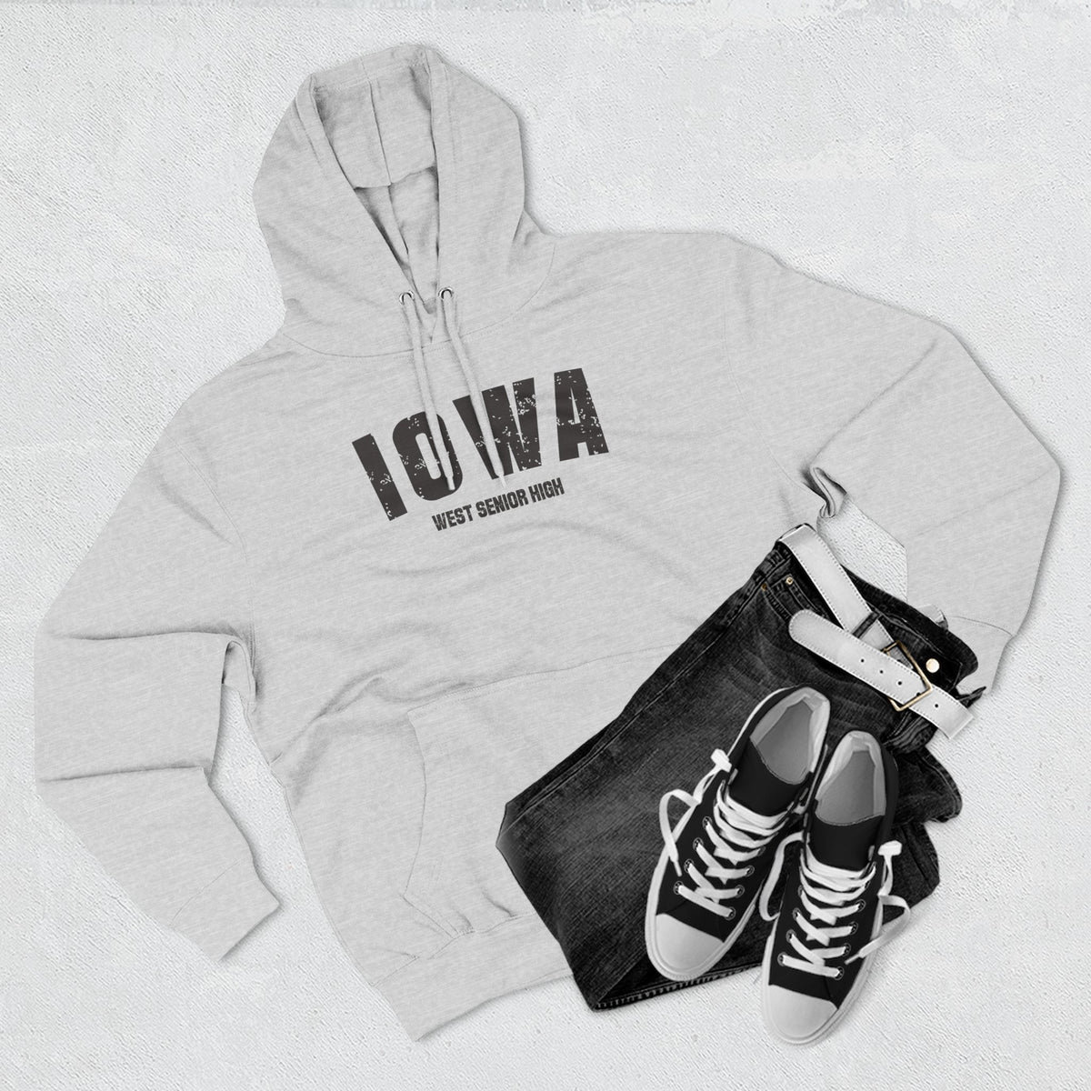Heather grey Iowa hoodie styled flat with denim and trainers, varsity IOWA over WEST SENIOR HIGH