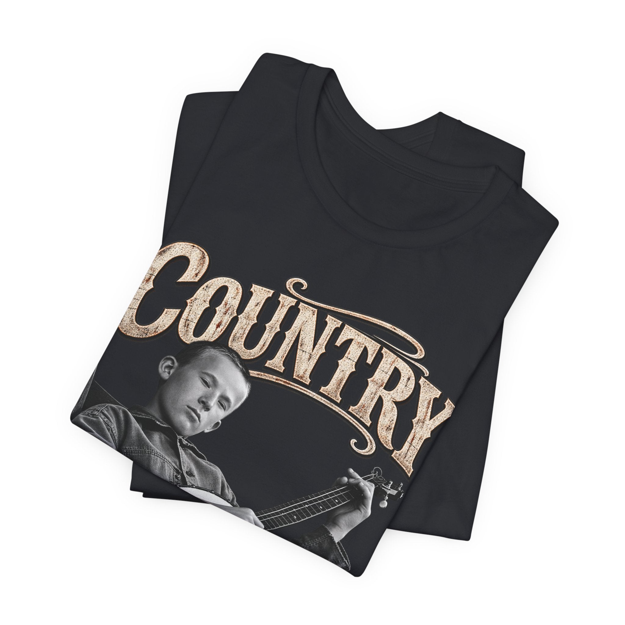 Black Country As Fuck tee folded in a stack, cream COUNTRY lettering on top