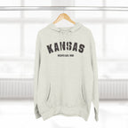 Oatmeal heather custom Kansas hoodie on a hanger, dark varsity KANSAS above WICHITA EAST HIGH