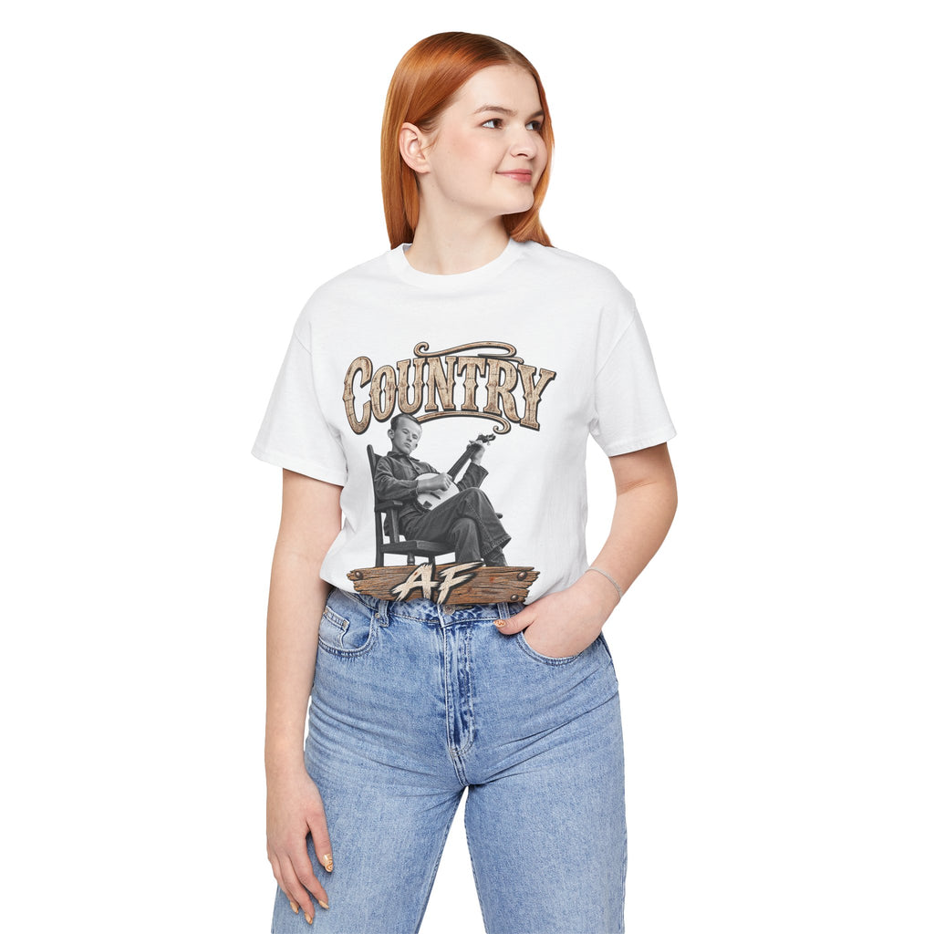 Red-haired woman in the White Country AF tee with blue jeans