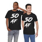 Two men standing together in black 50 AF birthday t-shirts and jeans