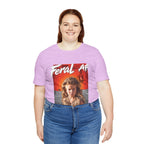 Woman wearing the Heather Prism Lilac Feral AF tee, pale purple fabric with the fiery front print
