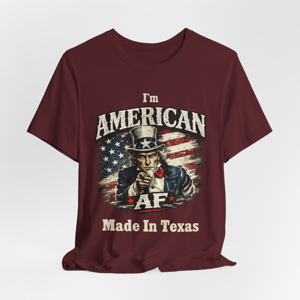 Maroon t-shirt casually draped, showing the Uncle Sam graphic and AF Made In Texas text.