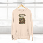 Oatmeal heather Missouri Midwestern As F**K hoodie hanging on a wooden hanger, Show-Me State graphic design