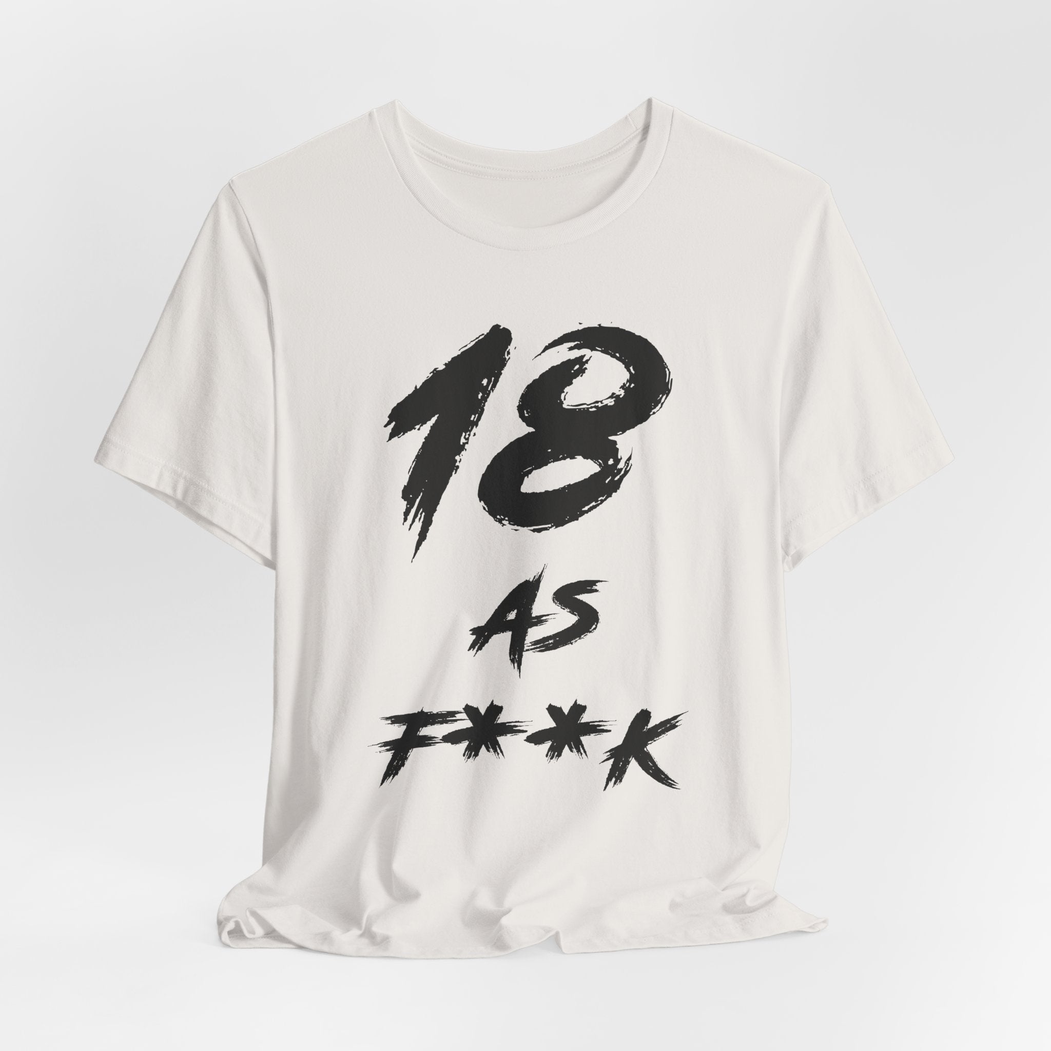 Vintage White birthday t-shirt laid flat with the black 18 AS F**K brush lettering